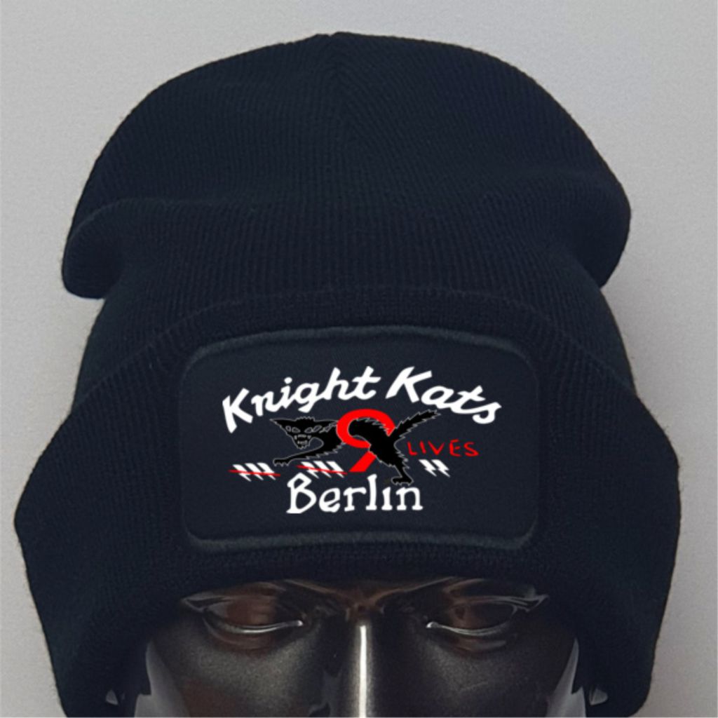 Black beanie with 'Knight Kats Lives Berlin' text on a gray background