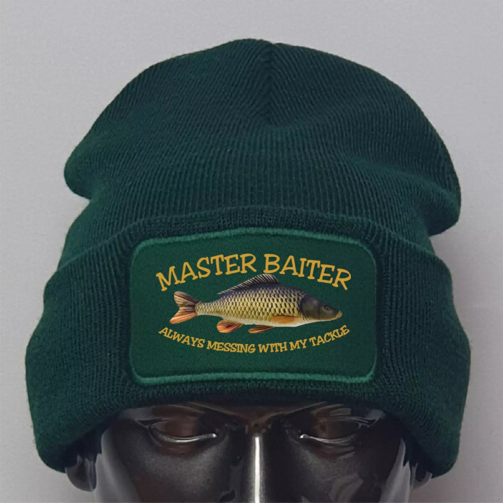 Green beanie with 'Master Baiter' patch featuring a fish on a gray background