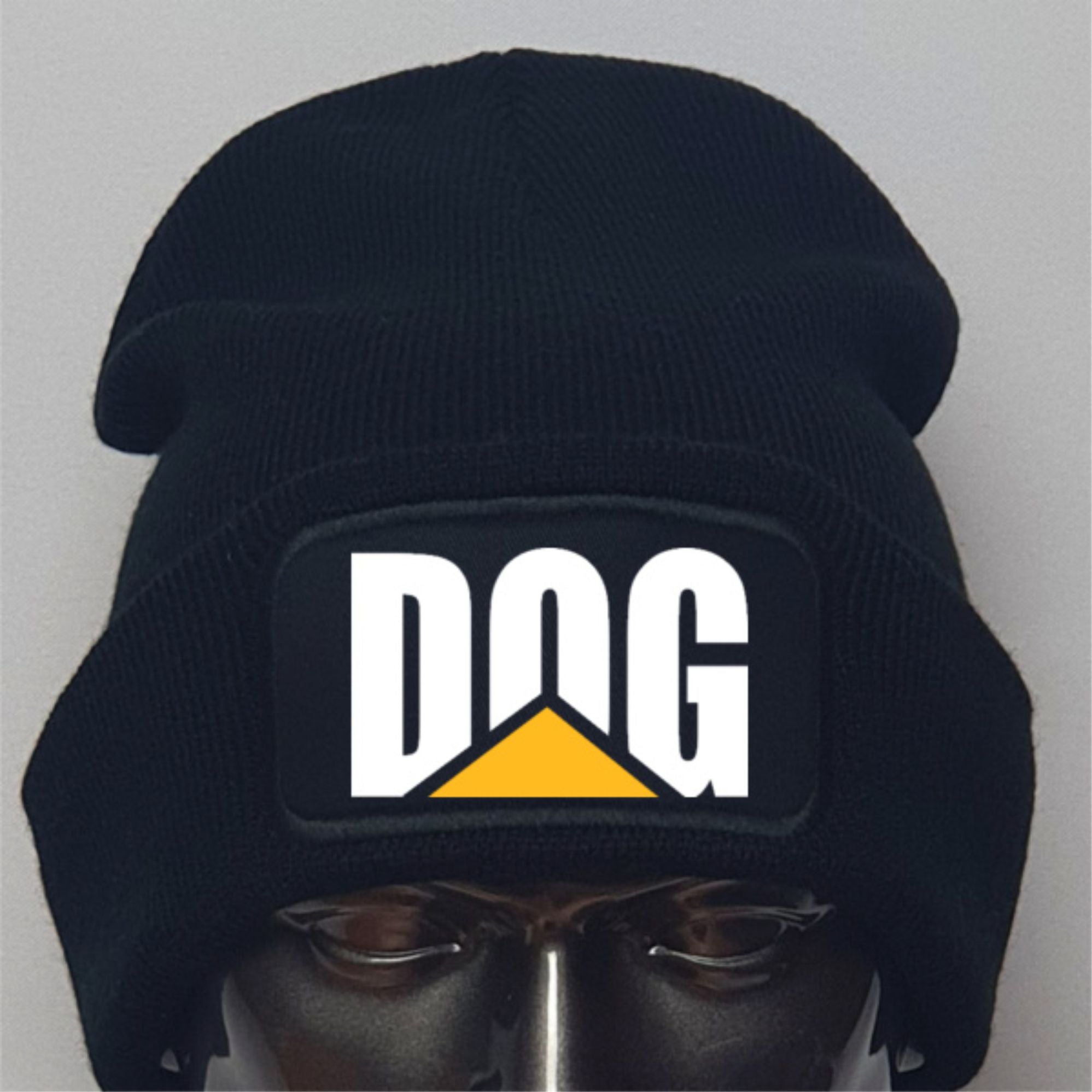 Black beanie with 'DOG' logo on a gray background