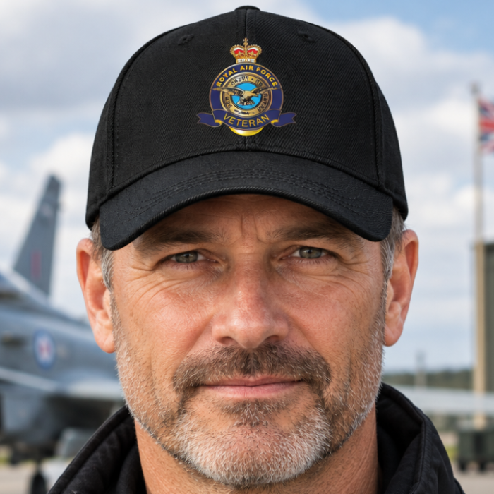 A black baseball cap featuring a detailed embroidered Royal Air Force Veteran emblem on the front, set against a plain white background.