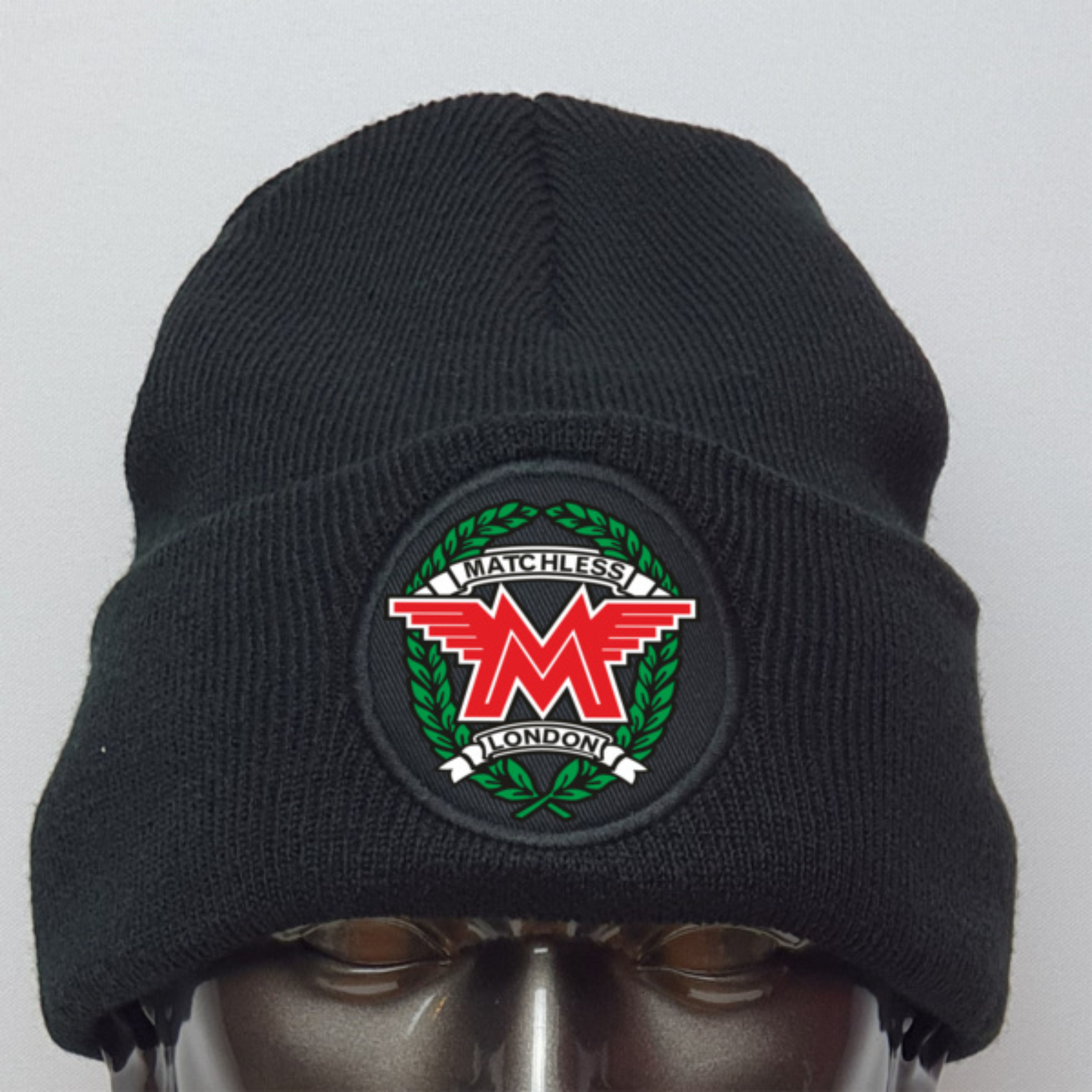 Black beanie with Matchless London logo on a mannequin head against a white background