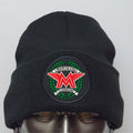 Black beanie with Matchless London logo on a mannequin head against a gray background