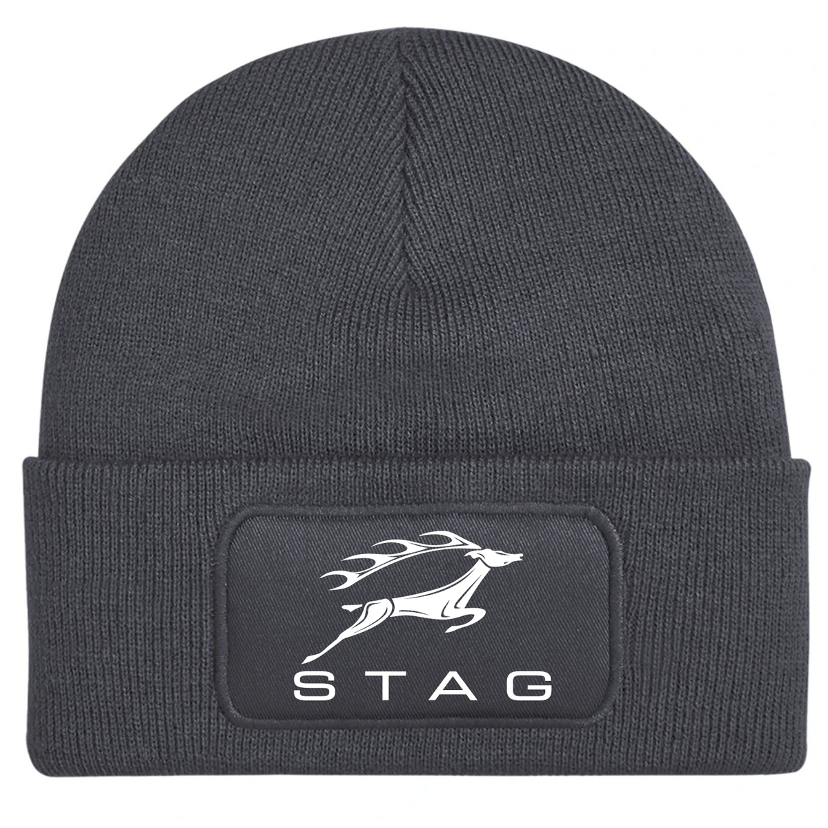 A dark gray ribbed knit beanie hat with a folded cuff, featuring a black rectangular patch on the front with a white stag logo and the word 'STAG'.