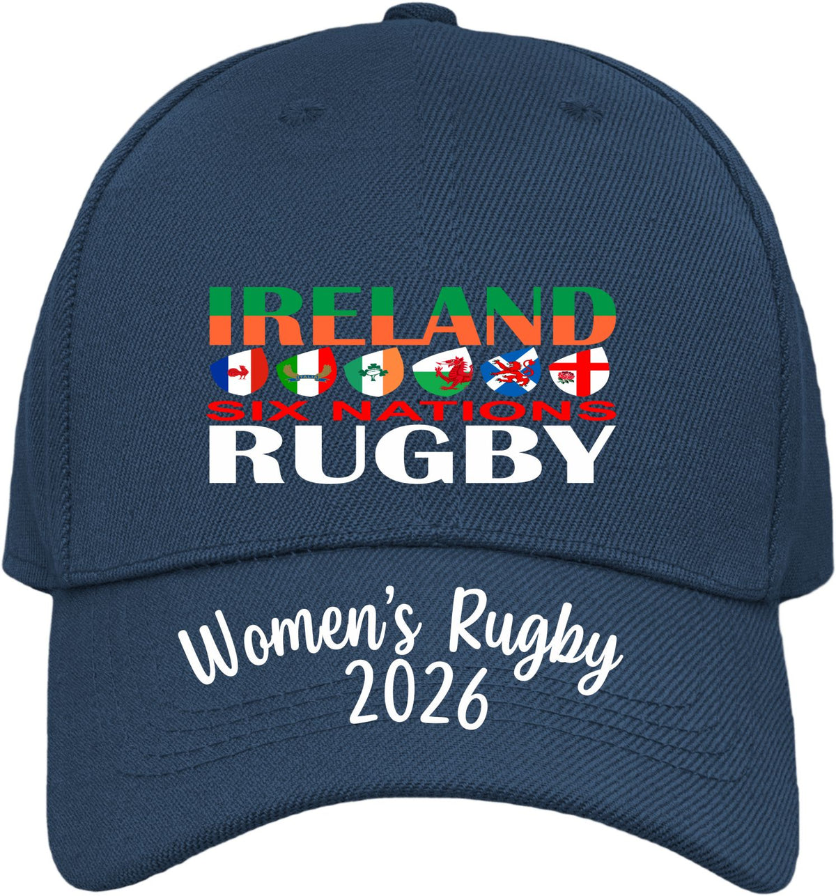 A navy blue baseball cap featuring a front graphic that reads 'IRELAND SIX NATIONS RUGBY' with colorful Irish flags and national team silhouettes, plus 'Women's Rugby 2026' printed in white script on the brim.