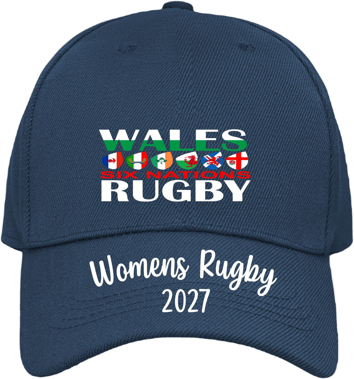 A navy blue baseball cap featuring a front graphic that reads 'WALES W23 RUGBY' with the Six Nations rugby team flags in the background, and 'Womens Rugby 2027' printed in white on the brim.