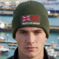 Olive beanie hat with the text 'STOP THE BOATS - PROTECT OUR BORDERS