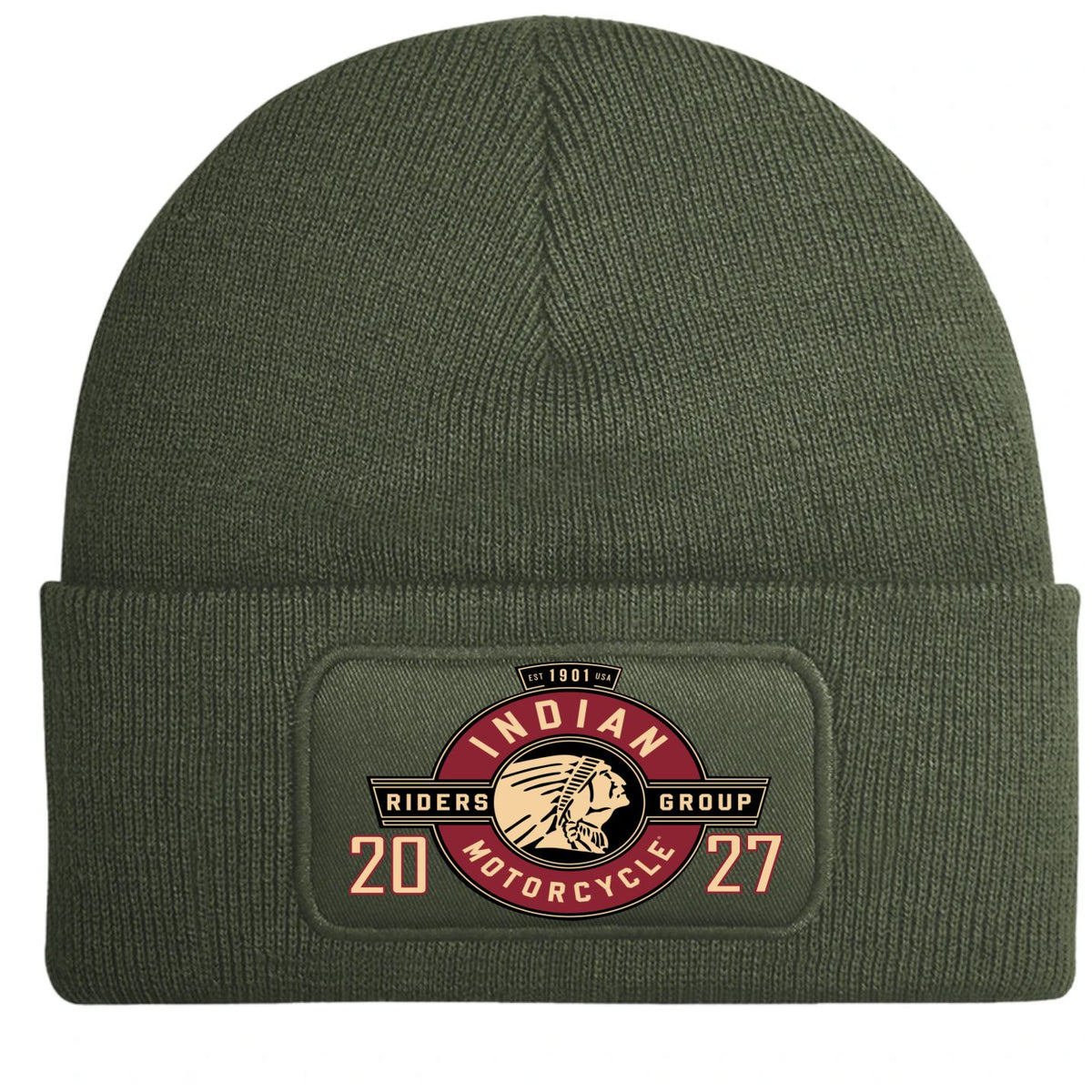 An olive-green knit beanie hat featuring a rectangular printed patch on the front cuff. The patch displays a circular logo with a Native American head illustration and the text 'Indian Riders Group Motorcycle 2027'.