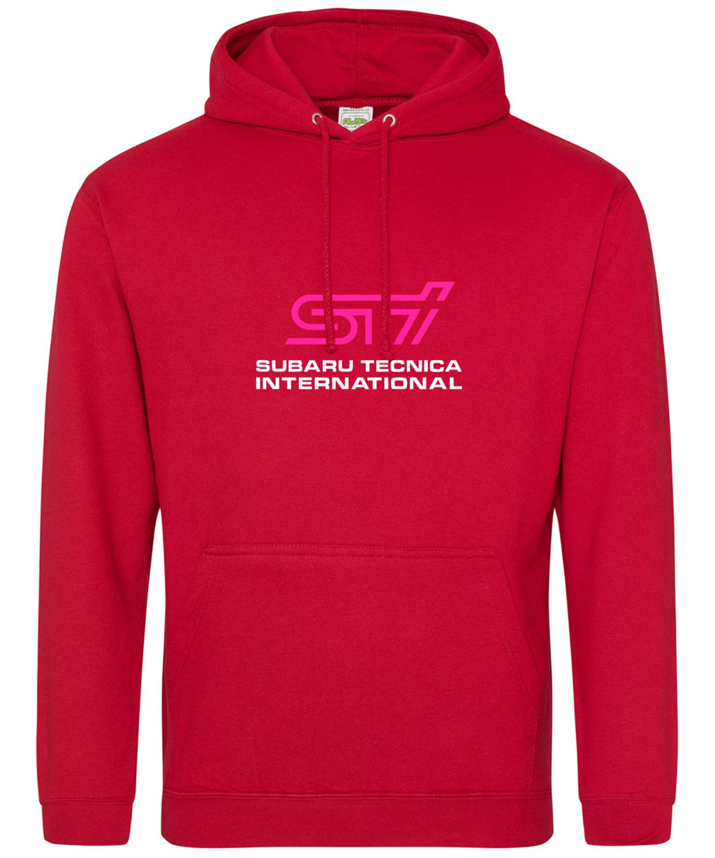A red pullover hoodie featuring a pink and white SUBARU TECNICA INTERNATIONAL text printed on the chest, displayed against a solid white background.