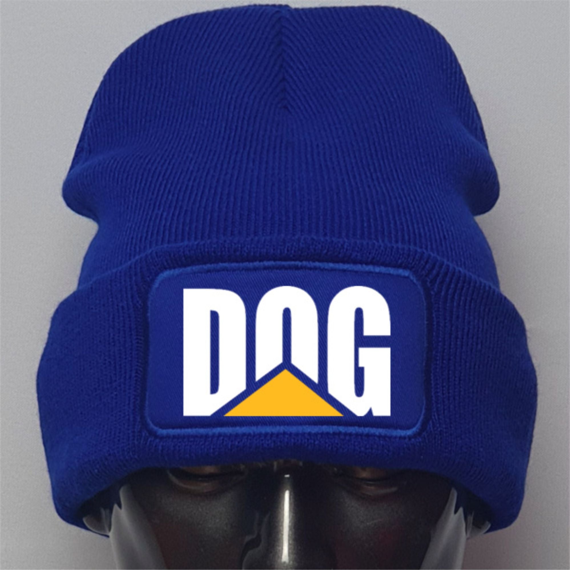 Blue beanie with a 'DOG' logo on a gray background