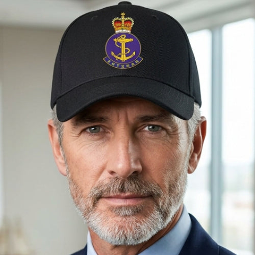 Man wearing a Royal Navy Veterans Cap.