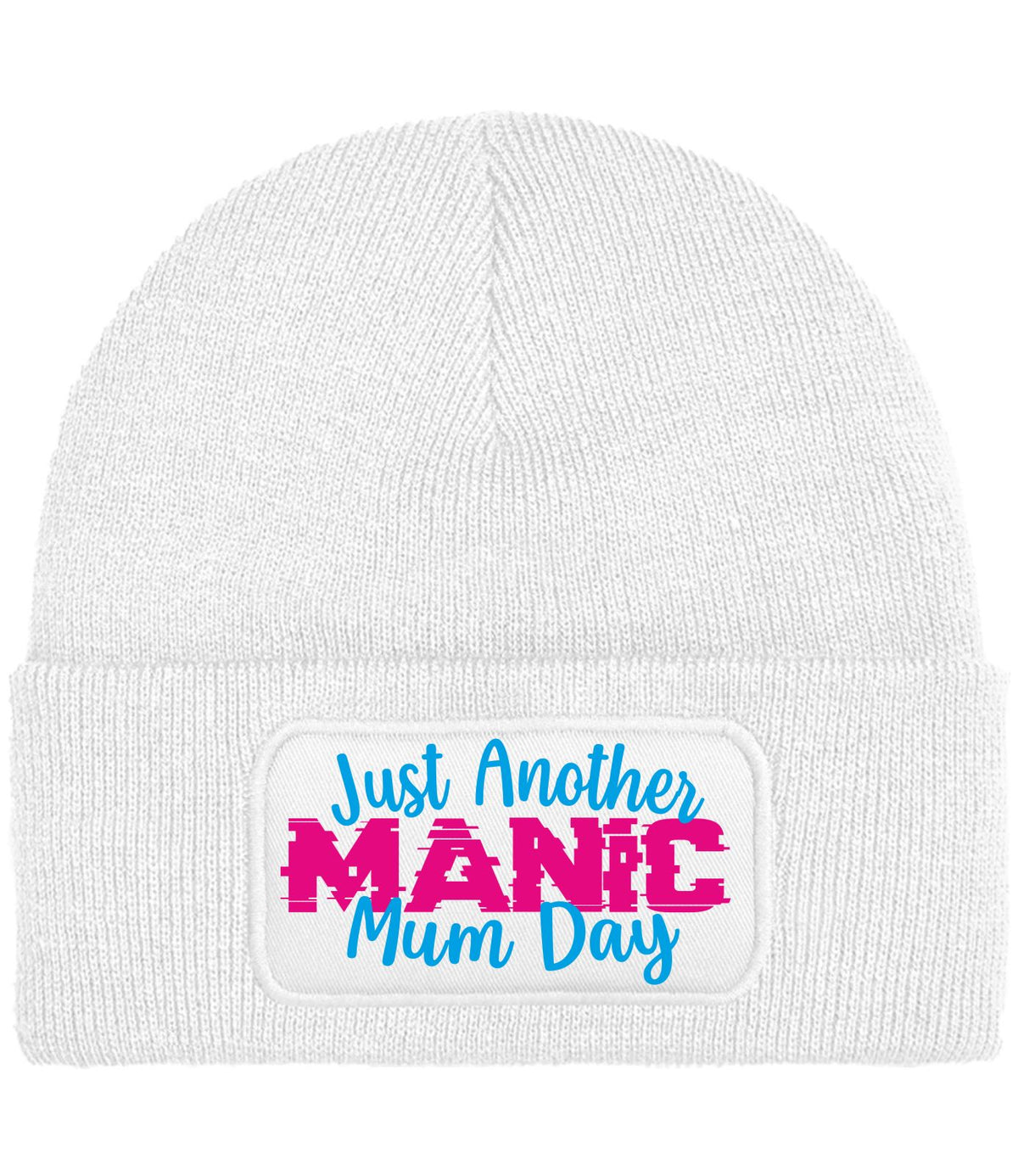 A white ribbed knit beanie hat featuring a white rectangular patch on the front cuff with the text 'Just Another MANIC Mum Day' in blue and pink lettering.