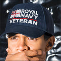 Person wearing a navy blue cap with 'Royal Navy Veteran' text and British flag design.