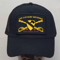 Black cap with '1st Cavalry Division The First Team' patch on a gray background