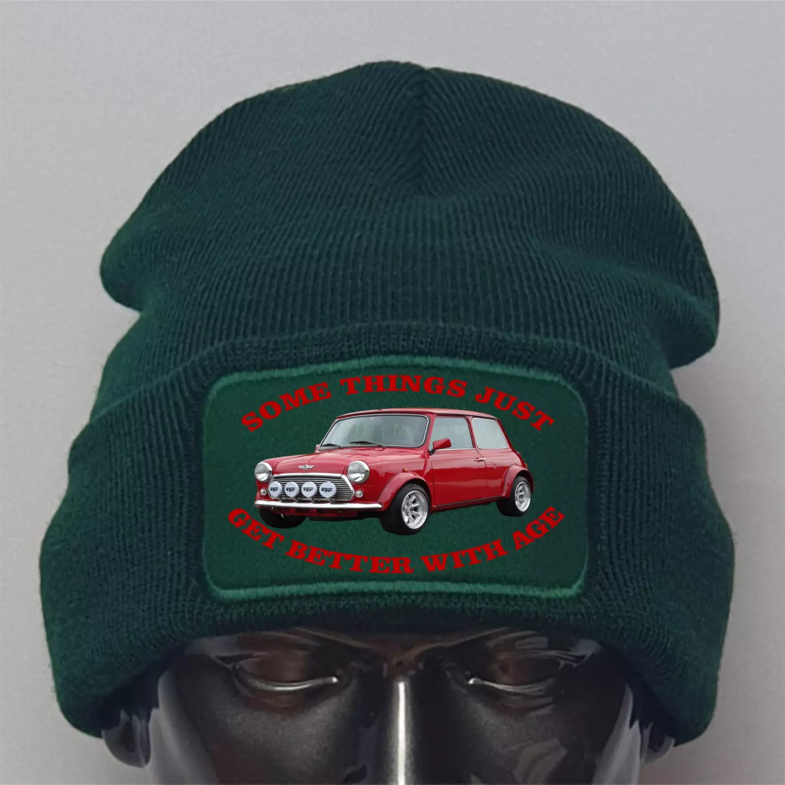 Green beanie with a red car graphic and text on a gray background