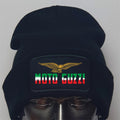 Black beanie with Moto Guzzi logo on a mannequin head against a gray background