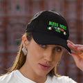 Person wearing a black cap with 'Kiss Me! I'm Irish' text.