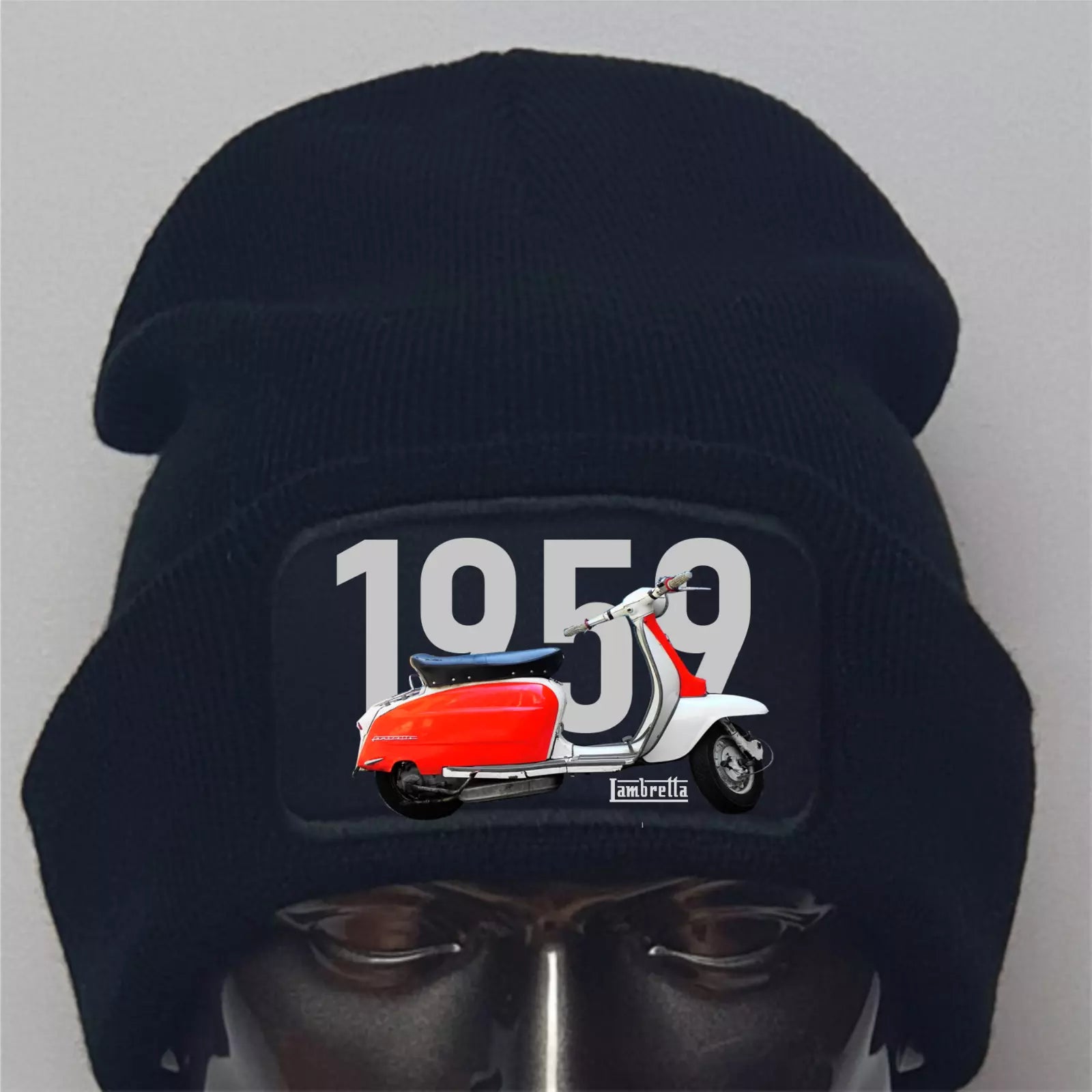 Black beanie with a Vespa scooter design and '1959' text on a gray background