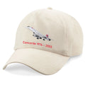 Beige cap with Concorde airplane design and text on a white background