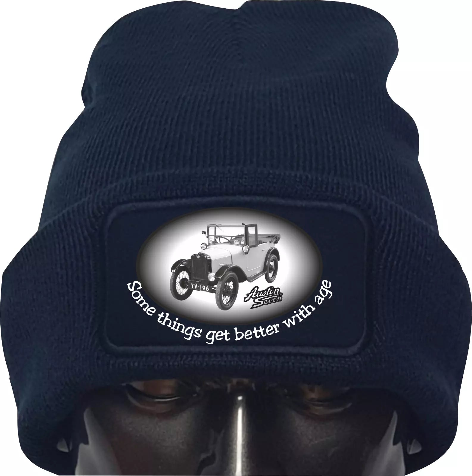 Navy blue beanie with vintage truck design and text on a white background