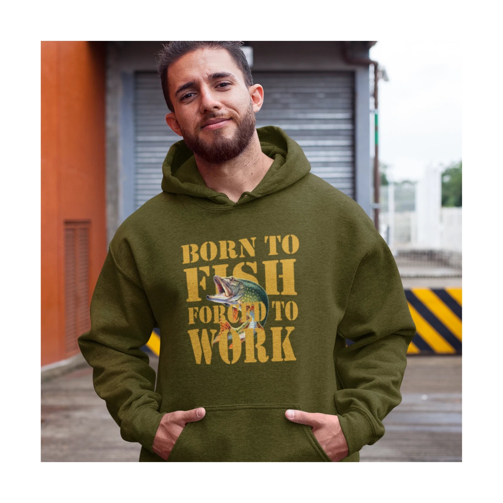 Man wearing a green hoodie with 'Born to Fish Forced to Work' text and fish graphic.