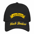 Black cap with yellow text 'The Vincent Black Shadow' on a white background