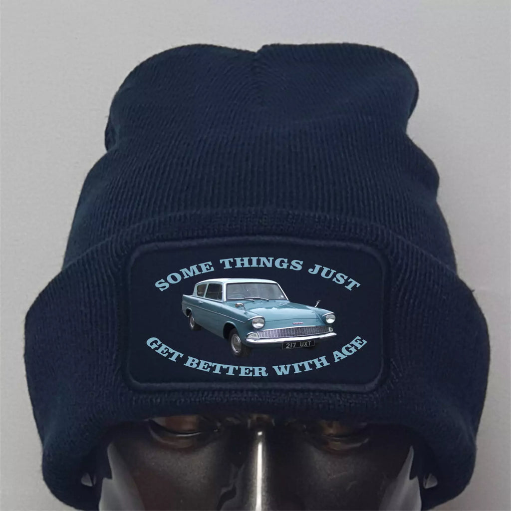 Navy blue beanie with a patch featuring a car and text on a gray background