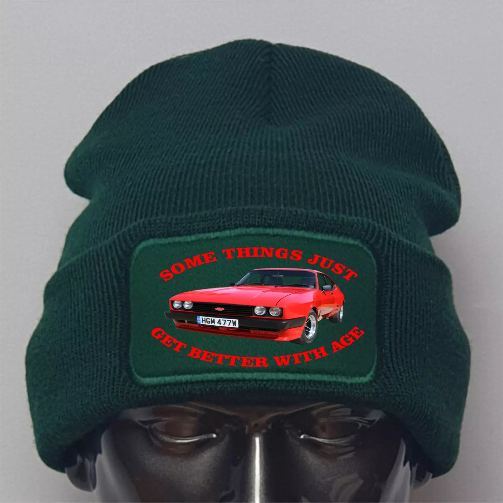 Green beanie with a red car graphic and text on a gray background